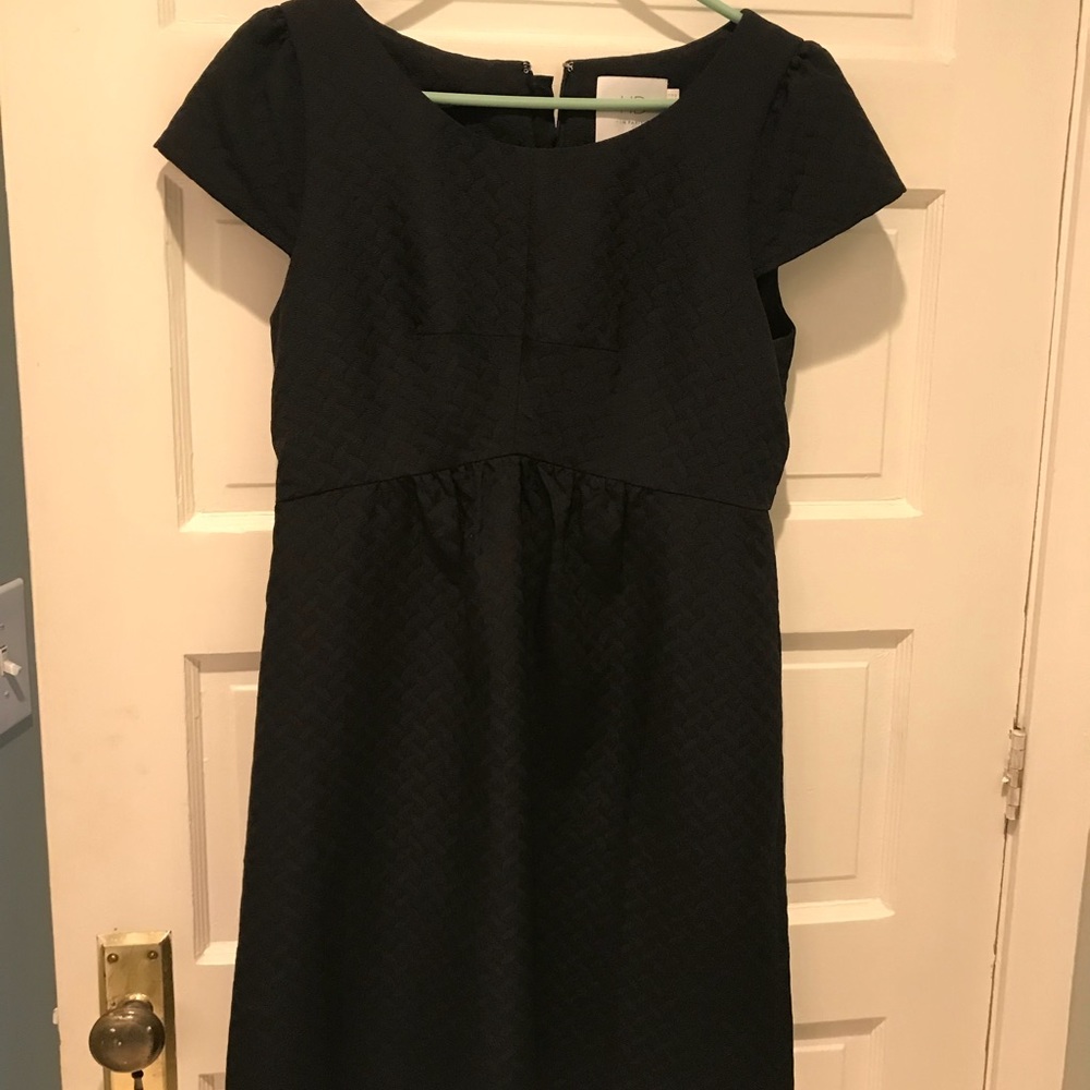 Black knee length party dress from Anthropologie